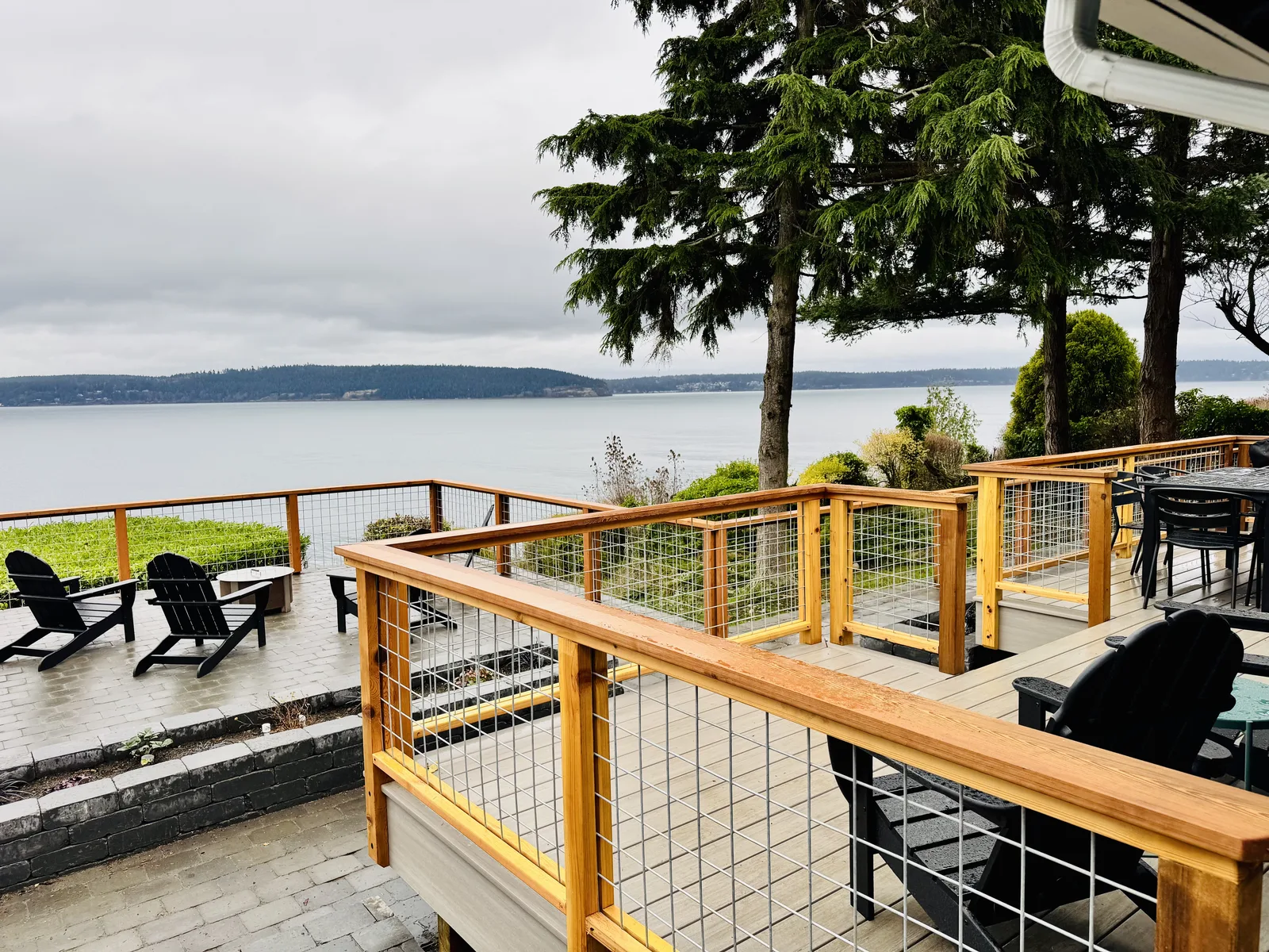 Custom deck with cable railing overlooking the water on Whidbey Island