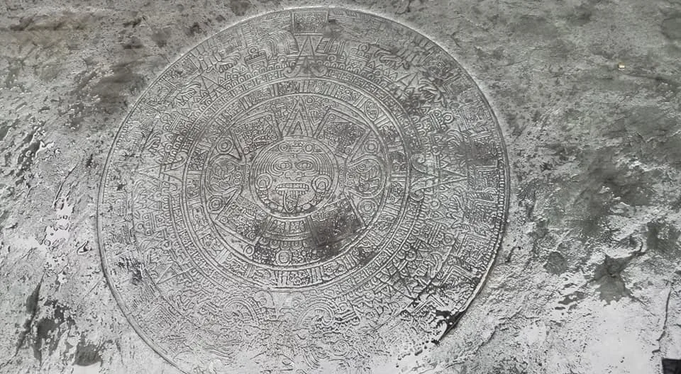 Stamped concrete patio with a circular medallion pattern